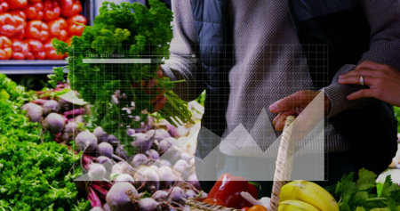 Selecting couple examining fresh produce at grocery store, with wicker basket and leafy parsley....
