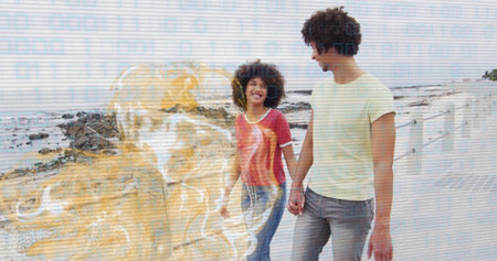 Walking couple holding hands along seaside promenade, with white railing and breaking ocean waves. Romance, leisure, serenity, companionship, coastal, nature, joyfulの写真素材