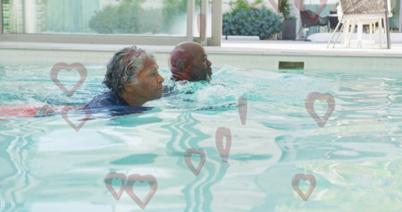 Swimming senior woman and mature man performing front crawl in lap pool, with swim shirts. Aquatic, fitness, minimalist, health, leisure, wellness, trainingの写真素材