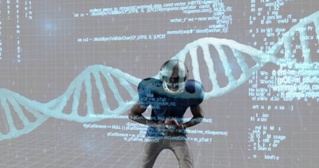 Crouching football player clenching fists in virtual 3D grid, with helmet, glowing DNA helix, code. Athlete, esports, futuristic, innovation, biomechanics, cyber, athleticismの写真素材