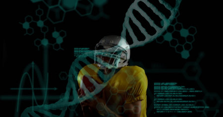 Football player in helmet and yellow jersey standing in virtual interface, with DNA helix and code. Athlete, technology, science, innovation, digital, futurism, researchの写真素材