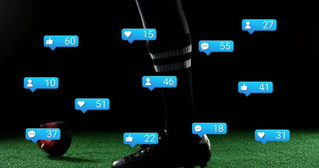 Balancing player's foot standing on turf, with socks, cleats, red-black soccer ball and blue icons....