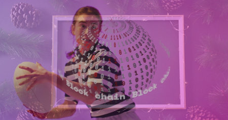 Striking woman in striped shirt holding rugby ball in studio, with binary sphere and pine branches. Dynamic, energetic, digital, futuristic, seasonal, eclectic, innovativeの写真素材