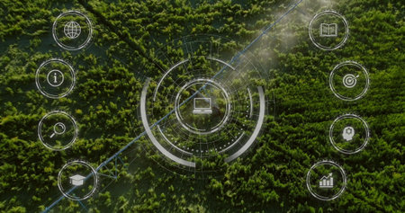 Overlaying concentric circles and laptop icon on forest canopy with pipeline track and icon buttons....