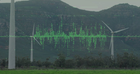 Showing three white wind turbines producing power on grassy foothills, with green waveform overlay....