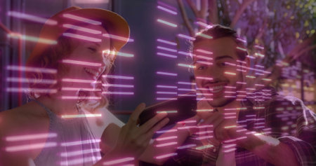 Leaning woman in straw hat and plaid-shirt man smiling while viewing smartphone at neon-lit lounge. Casual, friendship, nightlife, modern, vibrant, social, technologyの写真素材