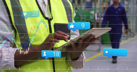 Tapping tablet screen, supervisor in neon vest reading factory floor line graphs and social icons....