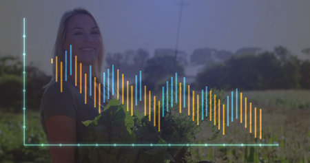 Holding woman farmer wearing shirt showcasing leafy greens in field, chart overlay, copy space....