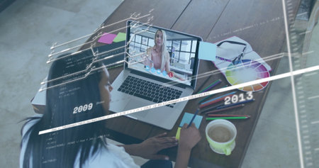 Woman scribbling sticky notes on laptop in home workspace, with code overlays color wheel. Modern,...