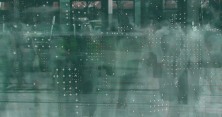 Walking blurred silhouettes behind green glass in lobby, floating grids of circles and squares....