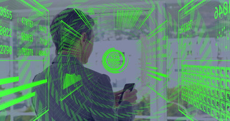 Examining data panels businesswoman in blazer holding smartphone in modern office, green holograms....