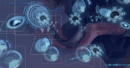 Holding coffee mug, tech professional studying holographic data visuals on wooden desk in office....