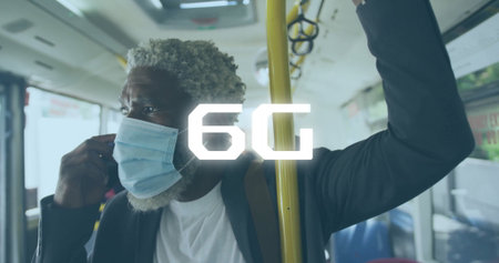 Standing commuter gripping yellow pole and adjusting mask strap on transit bus, with backpack....