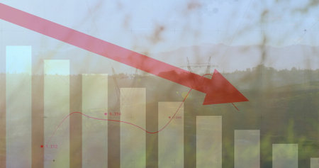 Displaying red downward arrow overlaying rural grassland, with bars, red line graph, power towers. Finance, analytics, visualization, data, economy, investment, growthの写真素材
