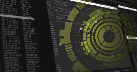Displaying yellow-green circular HUD graphic rotating on desktop, with code window, copy space....
