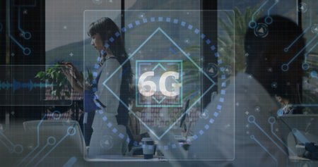 Projecting transparent 6G holographic interface in open-plan office, featuring smartphone, laptops. Futuristic, innovation, collaboration, technology, workspace, sleek, connectivityの写真素材