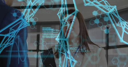 Viewing woman in blazer holding tablet and coworker in suit examining 3D molecular model in office....