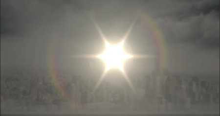 Shining sun emitting starburst rays over city skyline, with lens flare rings and skyscrapers. Solar,...