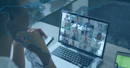 Leaning office worker clasping chin, participating in virtual meeting at home office with laptop....