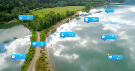 Showing grassy peninsula with dirt path extending into calm lake, with floating social media icons....