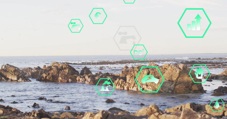 Floating icons showing COâ, water, chart, money, faucet, bolt above rocky tide pools with boulders. Coastal, environmental, sustainability, marine, conservation, digital, analyticalの写真素材
