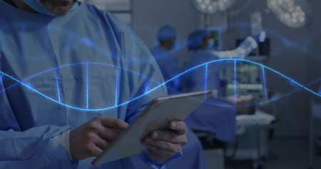 Holding tablet surgeon in blue scrubs examining holographic DNA in surgical suite, copy space....