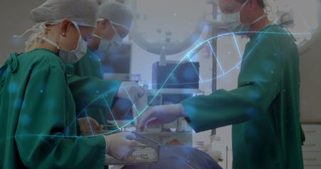 Performing surgery three surgeons wearing green scrubs operating on patient in OR, with DNA helix....