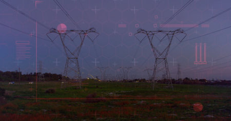 Displaying high-voltage towers, power lines rising over grassy field at dusk, with digital overlays....
