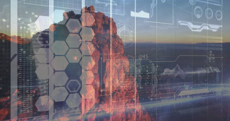 Glowing sunlit red rock cliff formation in warm desert canyon sunset, with hexagonal grid overlay....