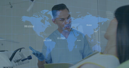 Dentist in scrubs and gloves consulting patient at dental chair, with clipboard, world map overlay. Healthcare, professionalism, diagnostics, medical, education, technology, clinicalの写真素材
