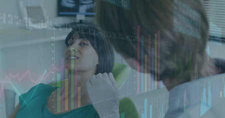 Leaning dentist examining patient in dental chair, with mirror and monitors showing data overlay. Clinical, diagnostic, healthcare, technology, professionalism, modern, ergonomicの写真素材