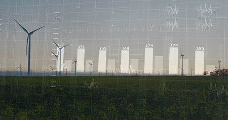 Showing large wind turbine spinning over green crops on farmland, with metric overlays, copy space....