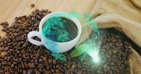Sitting white mug of black coffee on cafe tabletop with burlap sack, beans, green hologram globe....
