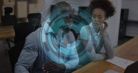 Collaborating professionals analyzing holographic interface in meeting room, with charts and laptop. Technology, teamwork, innovation, corporate, modern, digital, communicationの写真素材