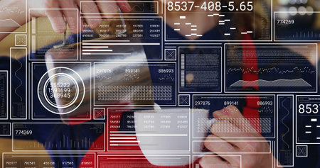 Analyzing data businesswoman holding smartphone and coffee mug at office desk, with data graphics....