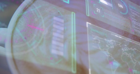 Projecting holographic display showing gauge chart map overlay at desk, with hand silhouette....