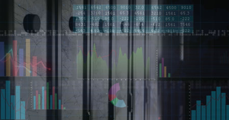 Displaying digital dashboard at data center with colored bar charts, line graphs, numeric data grid....