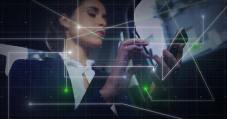 Holding smartphone with stylus pen, woman in dark blazer using digital network overlay in office....