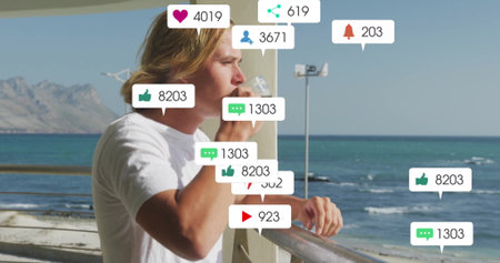 Drinking man leaning on metal beachside railing, with plastic water bottle and social media icons....