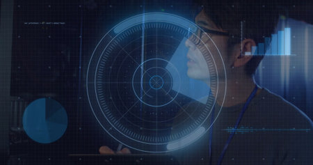 Pointing male data analyst wearing glasses and lanyard holding stylus near HUD in lab, copy space....