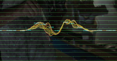 Data analyst analyzing waveform on tablet screen at home office desk, with stylus and laptop....