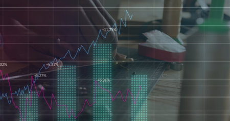 Placing knife on green mat, maker at studio bench, financial overlay, copy space. Craftsmanship, workshop, innovation, precision, handcrafted, creative, industrialの写真素材