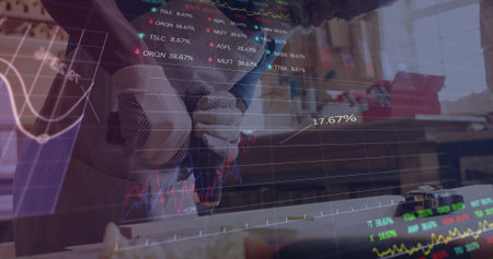 Drilling craftsman using handheld blue power drill into wood plank in workshop, stock data floating. Craftsman, woodworking, precision, craftsmanship, industrial, hardware, constructionの写真素材