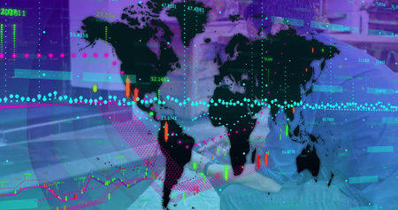 Displaying world map overlay with candlestick and trend data points in office lounge with tablet. Global finance, data analytics, business intelligence, technology, financial market, investment, corporateの写真素材