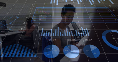 Data analyst woman analyzing floating bar, pie and line charts on smartphone in office, with graphs. Analytics, teamwork, innovation, digital, professional, collaboration, modernityの写真素材