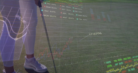 Visualizing woman golfer analyzing data overlays on putting green, with golf club, copy space. Sports, analytics, technology, outdoor, fitness, professional, innovationの写真素材