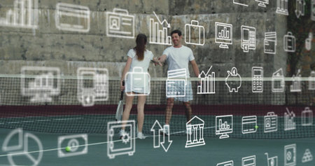 Shaking hands two tennis players holding rackets on outdoor hard court, with floating digital icons. Athletics, competition, collaboration, sport, professionalism, technology, urbanの写真素材
