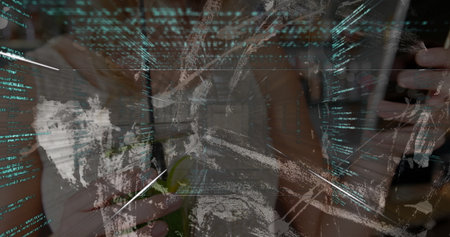 Typing woman developer holding green bottle and using laptop on home office desk, with code overlay....