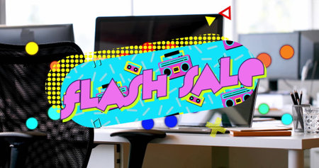 Displaying vibrant flash sale graphic in open-plan office, with computer monitors and chair....