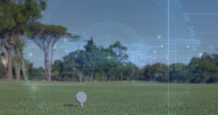 Displaying white golf ball resting on tee at manicured grass tee box, with translucent HUD overlay. Sports, outdoor, precision, technology, recreation, competition, landscapeの写真素材